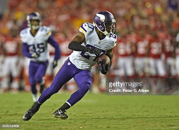Defensive back Shaun Prater of the Minnesota Vikings returns an interception against the Kansas City Chiefs during the second half on August 23, 2014...