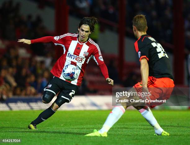 Jota attacks for Brentford during the Capital One Cup Second Round match between Brentford and Fulham at Griffin Park on August 26, 2014 in London,...