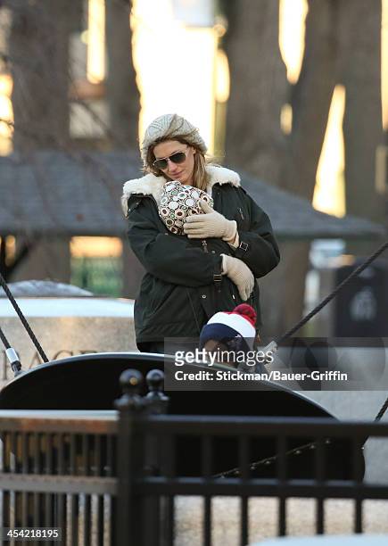 Gisele Bundchen and Vivian Brady with John Moynahan are seen on December 07, 2013 in Boston, Massachusetts.