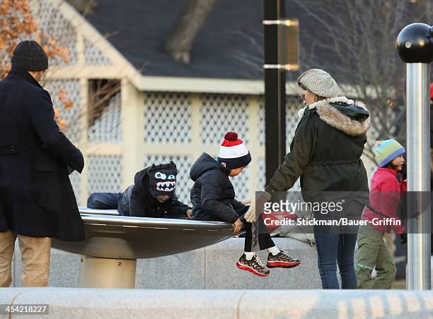 Gisele Bundchen and Tom Brady with children, Vivian Brady, John Moynahan and Benjamin Brady are seen on December 07, 2013 in Boston, Massachusetts.