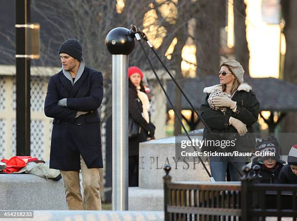 Gisele Bundchen and Tom Brady with children, Vivian Brady, John Moynahan and Benjamin Brady are seen on December 07, 2013 in Boston, Massachusetts.