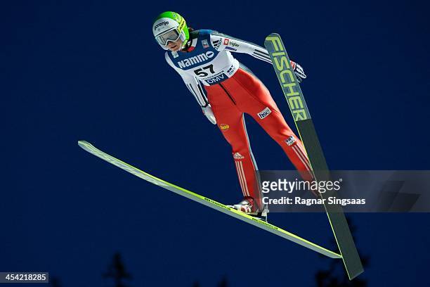 Eva Logar of Slovenia competes during the FIS Ski Jumping World Cup Women's HS100 on December 7, 2013 in Lillehammer, Norway.