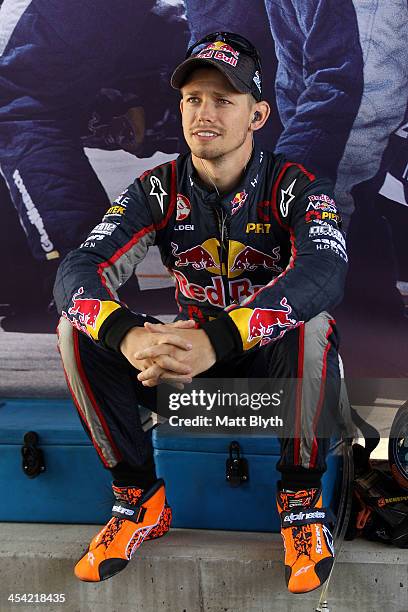 Casey Stoner driver of the Red Bull Pirtek Holden looks on prior to the Dunlop Development Series race at Sydney Olympic Park Street Circuit on...