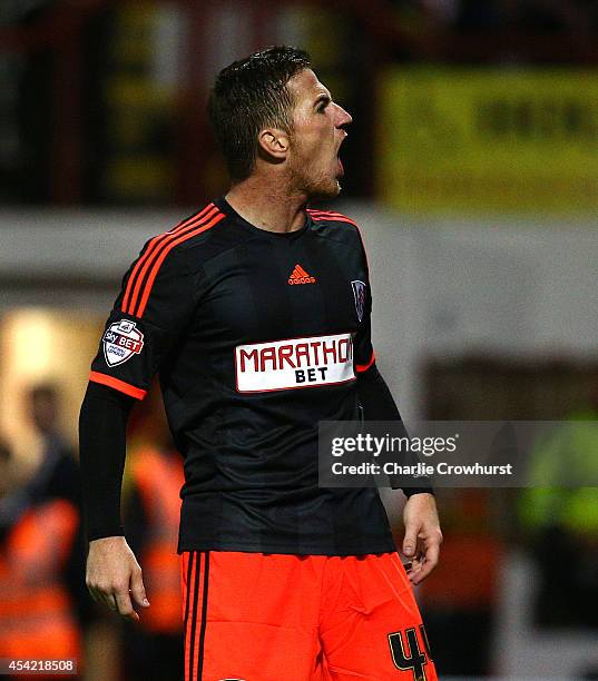 Ross McCormack of Fulham celebrates after scoring the first goal of the game during the Capital One Cup Second Round match between Brentford and...