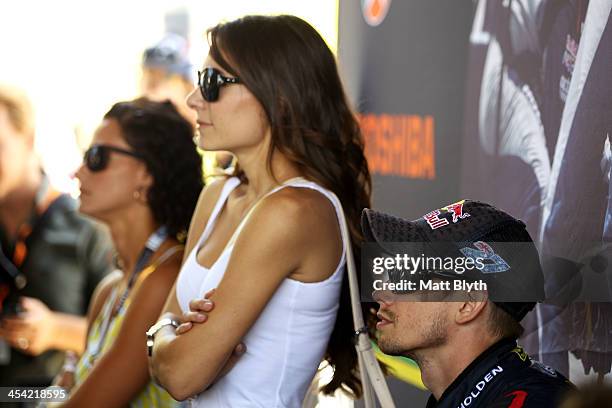 Casey Stoner driver of the Red Bull Pirtek Holden is seen with his wife Adriana prior to the Dunlop Development Series race at Sydney Olympic Park...