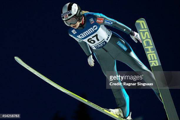 Anette Sagen of Norway competes during the FIS Ski Jumping World Cup Women's HS100 on December 7, 2013 in Lillehammer, Norway.