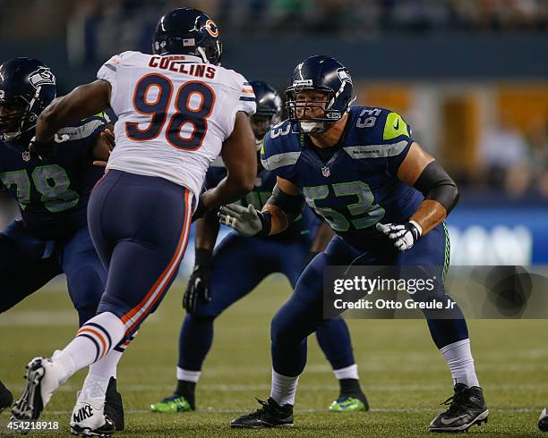 Guard Stephen Schilling of the Seattle Seahawks pass blocks against the Chicago Bears at CenturyLink Field on August 22, 2014 in Seattle, Washington.