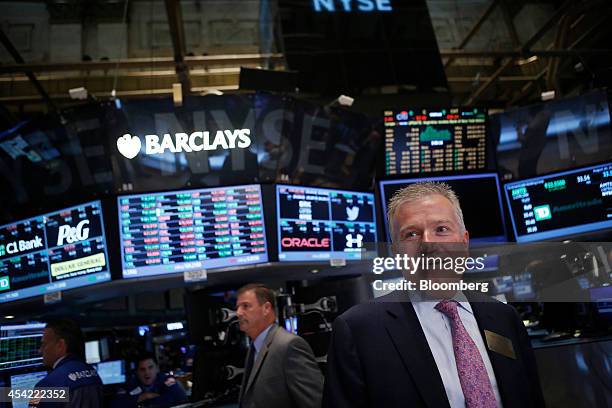Duncan Niederauer, chief executive officer and a director of NYSE Euronext Inc., walks the floor before ringing the closing bell at the New York...