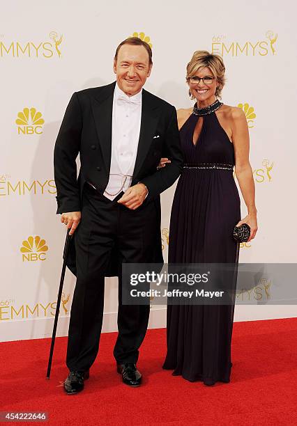 Actor Kevin Spacey and Ashleigh Banfield arrive at the 66th Annual Primetime Emmy Awards at Nokia Theatre L.A. Live on August 25, 2014 in Los...