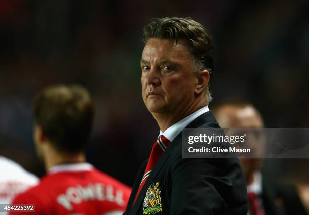 Manager Louis van Gaal of Manchester United looks on during the Capital One Cup second round match between MK Dons and Manchester United at Stadium...