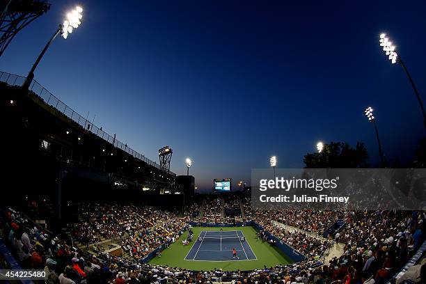 The sunset as Gael Monfils of France plays against Jared Donaldson of the United States during theirs men's singles first round match on Day Two of...