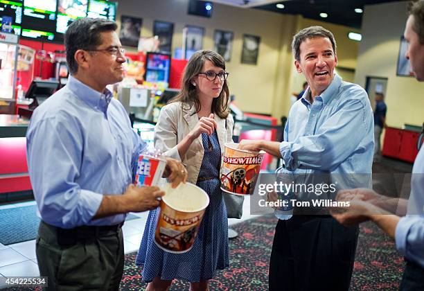 Andrew Romanoff, right, Democratic candidate for Colorado's 6th Congressional District, aide Denise Baron, and Rep. Xavier Becerra, D-Calif., are...