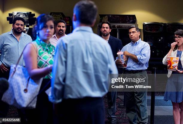 Andrew Romanoff, Democratic candidate for Colorado's 6th Congressional District, is interviewed as, from left, co-owners, Cesar Sanchez, Roberto...