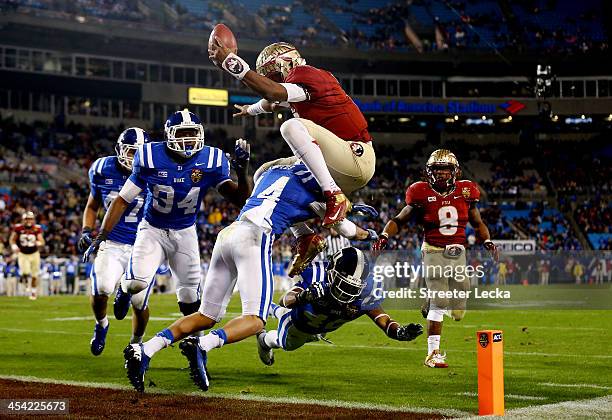 Quarterback Jameis Winston of the Florida State Seminoles scores a touchdown in the third quarter against the Duke Blue Devils during the ACC...