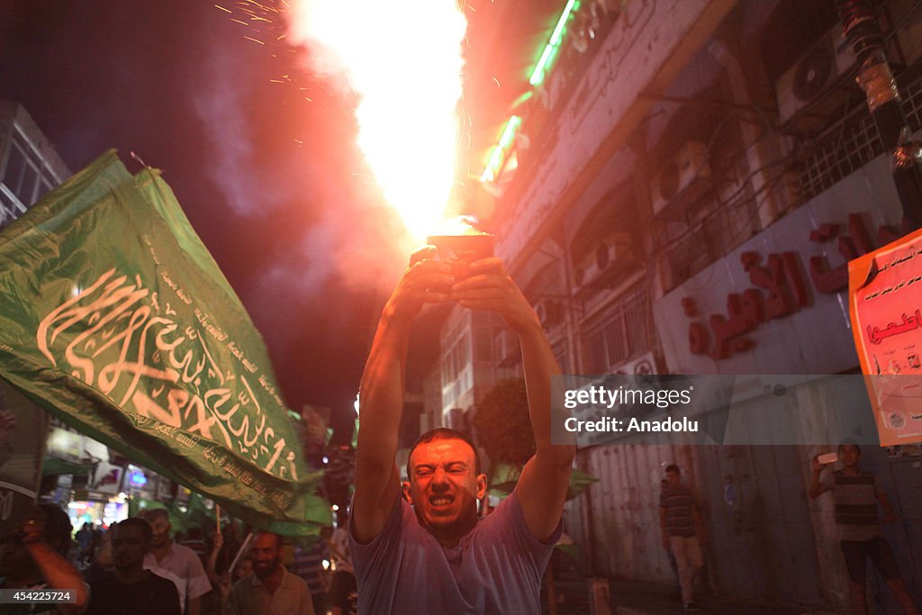 Palestinians celebrate Gaza ceasefire in Ramallah