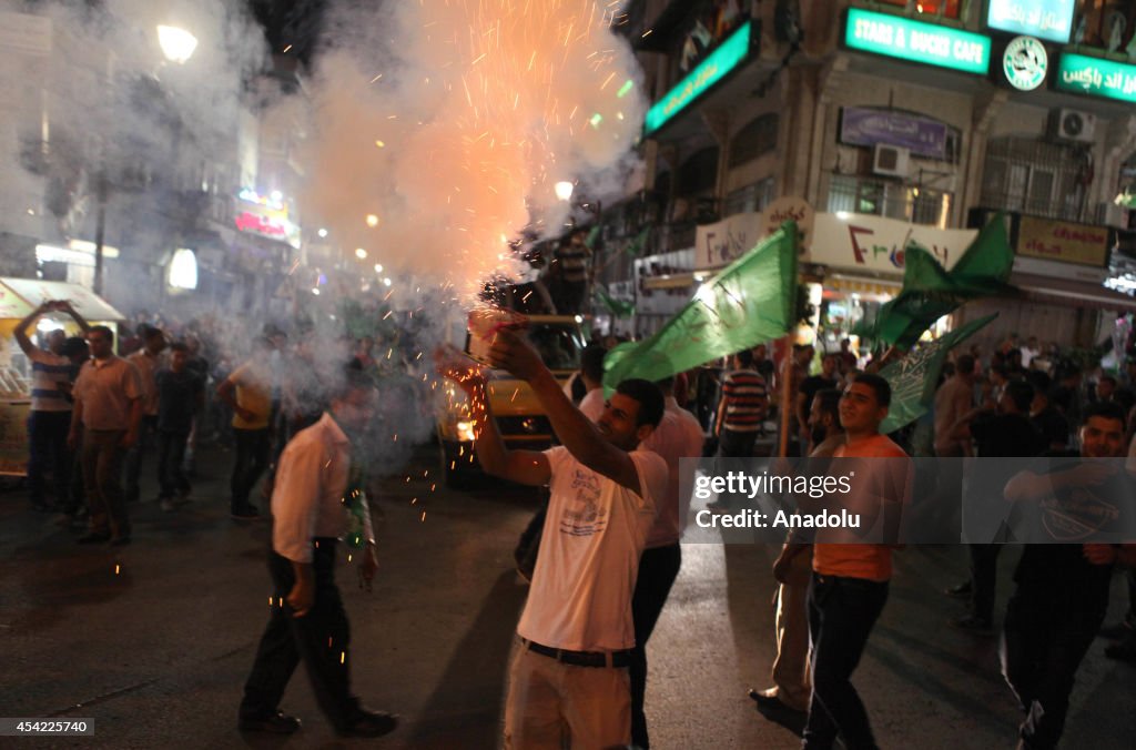 Palestinians celebrate Gaza ceasefire in Ramallah