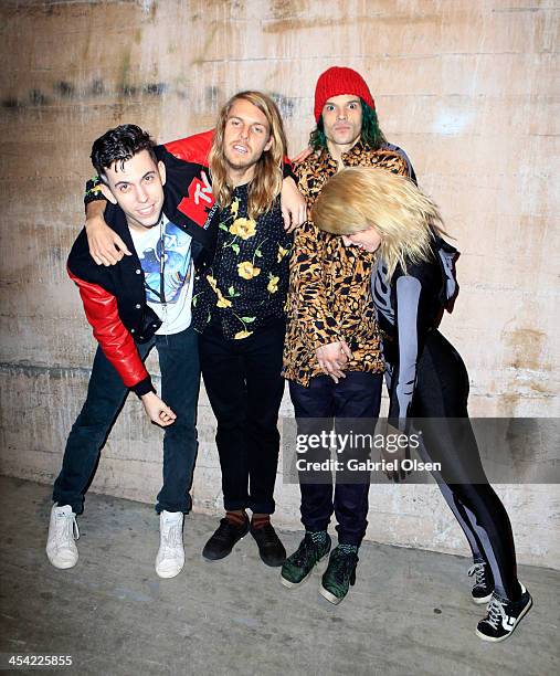 Musicians Ryan Rabin, Andrew Wessen, Christian Zucconi and Hannah Hooper of Grouplove pose backstage during The 24th Annual KROQ Almost Acoustic...