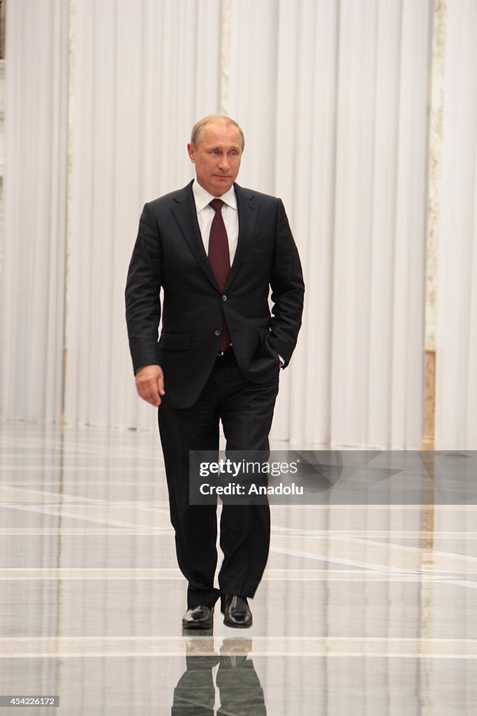 Russian President Vladimir Putin holds a press conference