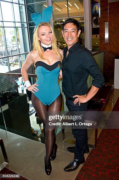 Personality Grant Imahara and cosplayer Jennifer Newman dressed as a Star Trek Bunny posing for photos at the Hard Rock Hotel on Friday Day 2 of...