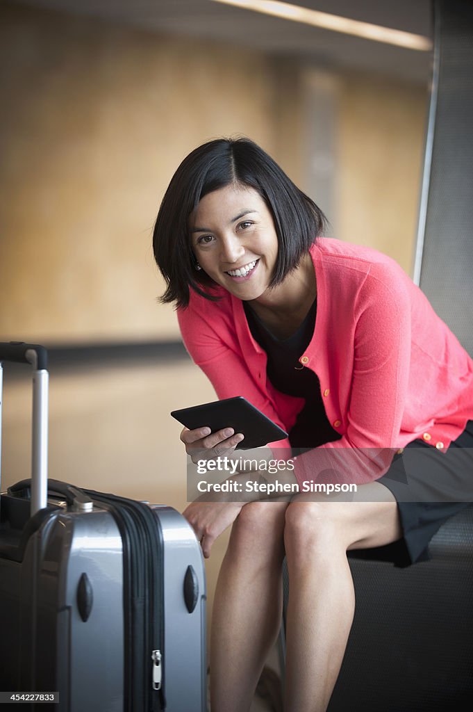 Businesswoman at  airport between flights