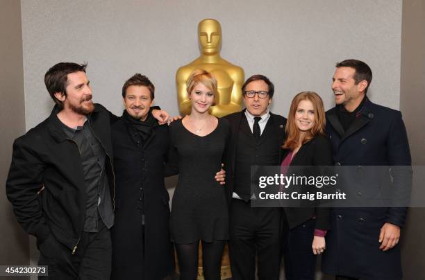 Christian Bale, Jeremy Renner, Jennifer Lawrence, David O. Russell, Amy Adams and Bradley Cooper attend the Academy of Motion Picture Arts and...