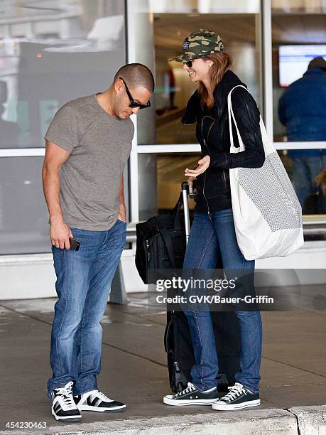 Stacy Keibler and Jared Pobre seen arriving at LAX airport on December 07, 2013 in Los Angeles, California.