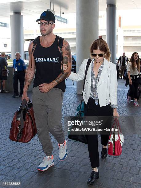 Kate Mara and boyfriend Johnny Wujek seen at LAX on August 26, 2014 in Los Angeles, California.