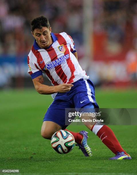 Cristian Rodriguez of Club Atletico d Madrid in action during the Supercopa, second leg match between Club Atletico de Madrid and Real Madrid at...