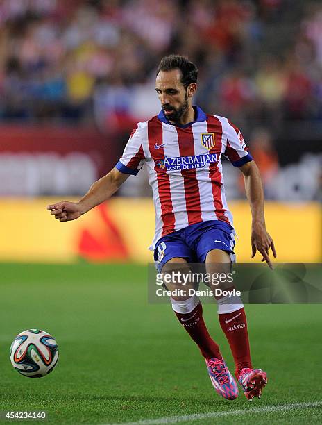 Juanfran of Club Atletico de Madrid in action during the Supercopa, second leg match between Club Atletico de Madrid and Real Madrid at Vicente...