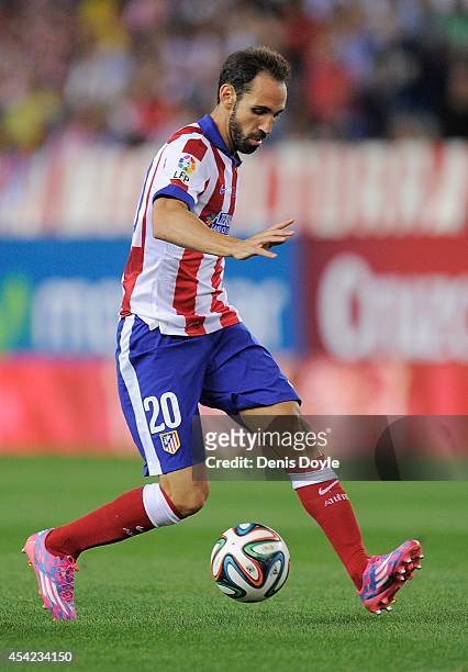 Juanfran of Club Atletico de Madrid in action during the Supercopa, second leg match between Club Atletico de Madrid and Real Madrid at Vicente...