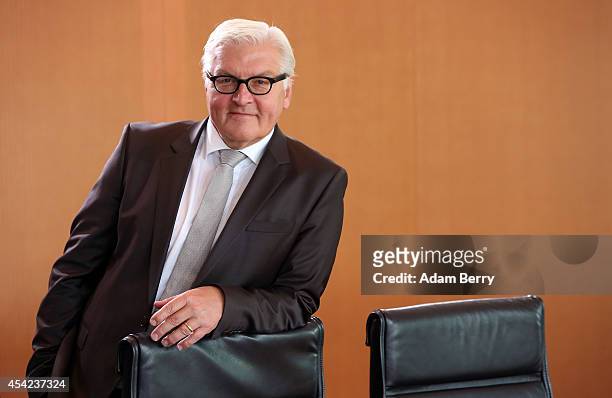 Foreign Minister Frank-Walter Steinmeier arrives for the weekly German federal Cabinet meeting on August 27, 2014 in Berlin, Germany. High on the...