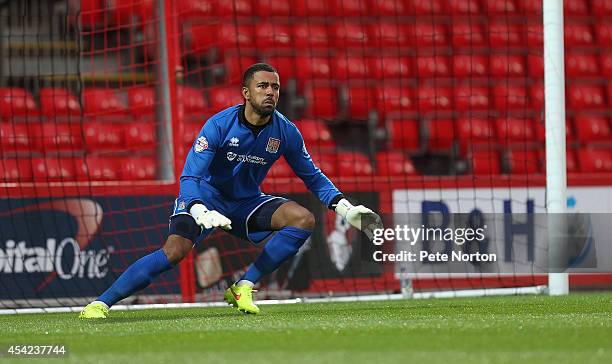 Jordan Archer of Northampton Town in action during the Capital One Cup Second Round match between AFC Bournemouth and Northampton Town at Goldsands...