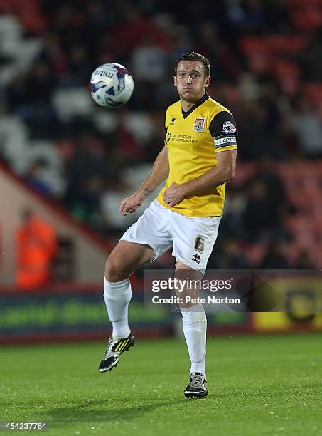 Lee Collins of Northampton Town in action during the Capital One Cup Second Round match between AFC Bournemouth and Northampton Town at Goldsands...