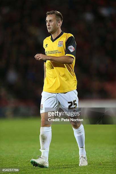 Joel Byrom of Northampton Town in action during the Capital One Cup Second Round match between AFC Bournemouth and Northampton Town at Goldsands...
