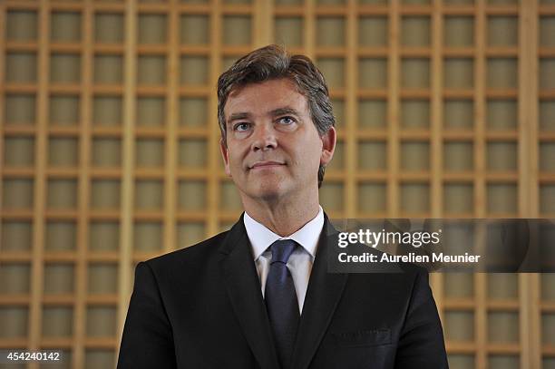 The former Minister of Finance, Arnaud Montebourg, attends at the inaugural speech of the new Minister of Finance, Emmanuel Macron at Ministere des...