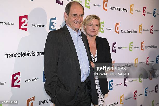 Chairman of the Cannes Film Festival Pierre Lescure and Anne-Elisabeth Lemoine pose during a photocall for French TV group France Televisions new...