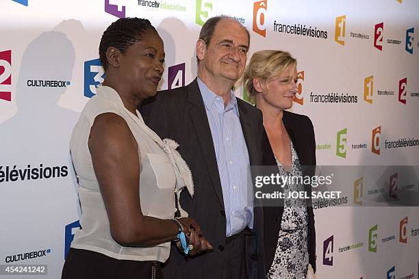 Babette de Rozieres, Pierre Lescure et Anne-Elisabeth Lemoine pose during a photocall for French TV group France Televisions new season's launching...