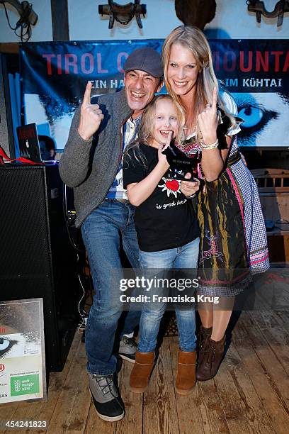 Gedeon Burkhard, Gioia Filomena Burkhard and Anika Bormann attend the Dorfstadl Evening - Tirol Cross Mountain 2013 on December 07, 2013 in...