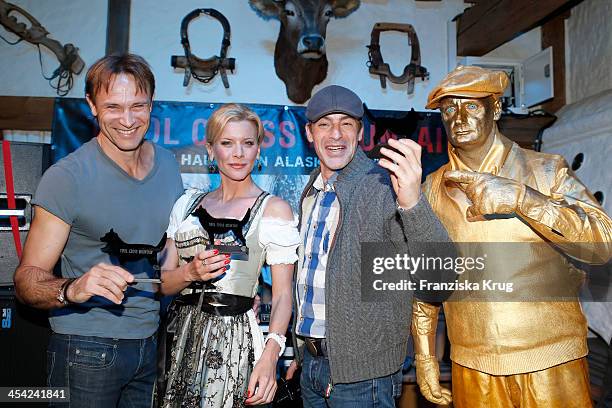 Bernhard Bettermann, Eva Habermann and Gedeon Burkhard receive an award at the Dorfstadl Evening - Tirol Cross Mountain 2013 on December 07, 2013 in...