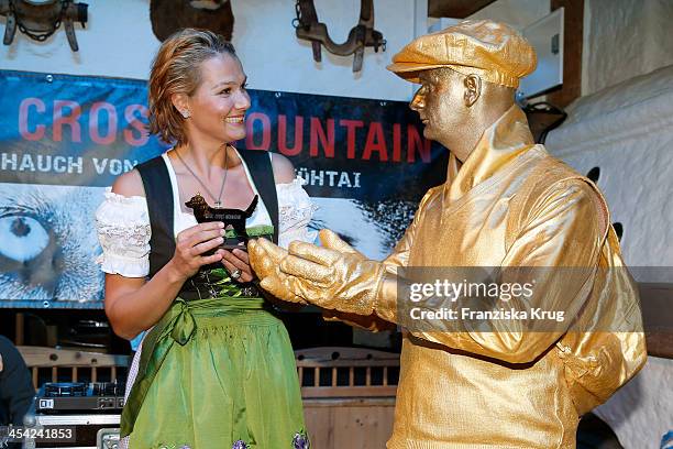 Franziska van Almsick receives an award at the Dorfstadl Evening - Tirol Cross Mountain 2013 on December 07, 2013 in Innsbruck, Austria.