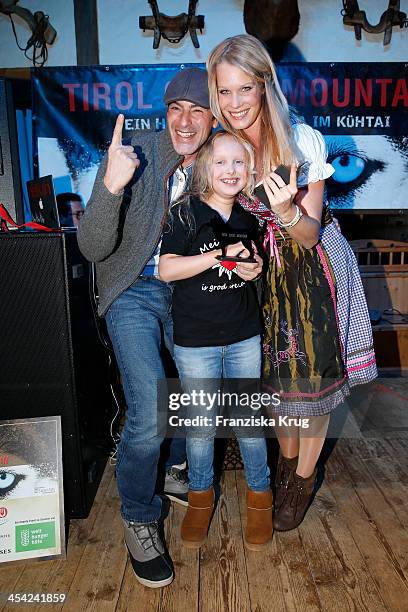 Gedeon Burkhard, Gioia Filomena Burkhard and Anika Bormann attend the Dorfstadl Evening - Tirol Cross Mountain 2013 on December 07, 2013 in...