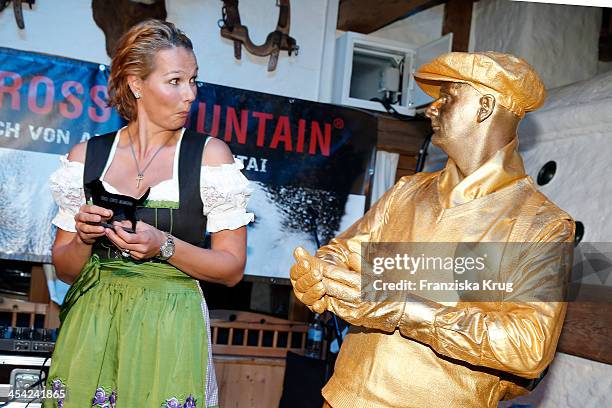 Franziska van Almsick receives an award at the Dorfstadl Evening - Tirol Cross Mountain 2013 on December 07, 2013 in Innsbruck, Austria.