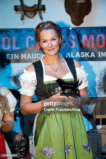 Franziska van Almsick receives an award at the Dorfstadl Evening - Tirol Cross Mountain 2013 on December 07, 2013 in Innsbruck, Austria.