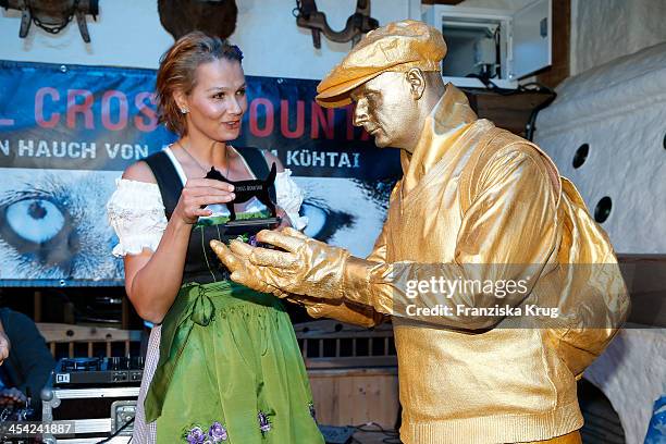 Franziska van Almsick receives an award at the Dorfstadl Evening - Tirol Cross Mountain 2013 on December 07, 2013 in Innsbruck, Austria.