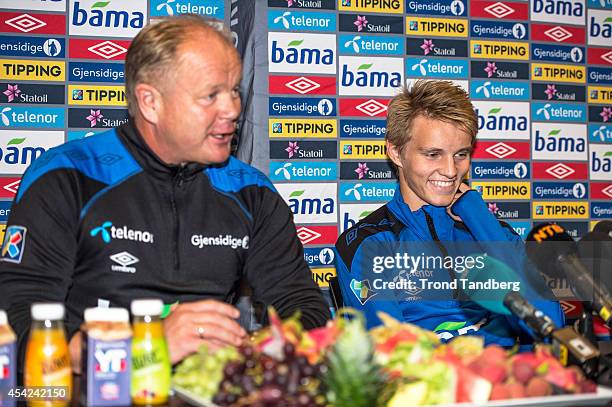 Martin Odegaard of Norway and Head Coach Per Mathias Hoegmo during a press conference at the Viking Stadion on August 26, 2014 in Stavanger, Norway....