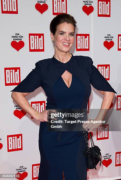 Katharina Witt attends the 'Ein Herz Fuer Kinder Gala 2013' at Flughafen Tempelhof on December 7, 2013 in Berlin, Germany.