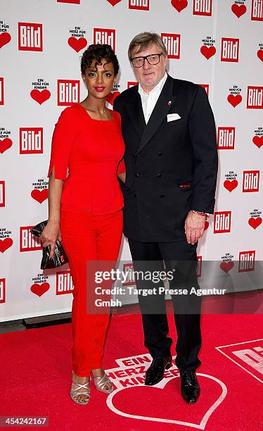 Dennenesch Zoude and guest attend the 'Ein Herz Fuer Kinder Gala 2013' at Flughafen Tempelhof on December 7, 2013 in Berlin, Germany.