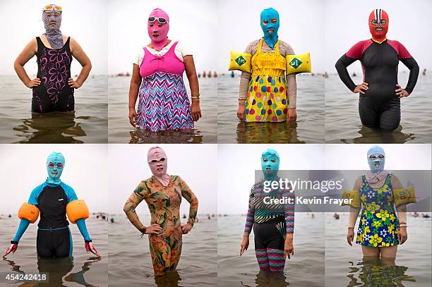 In this composite image Chinese women pose in face-kinis in the Yellow Sea on August 21, 2014 in Qingdao, China. The locally designed mask is worn by...