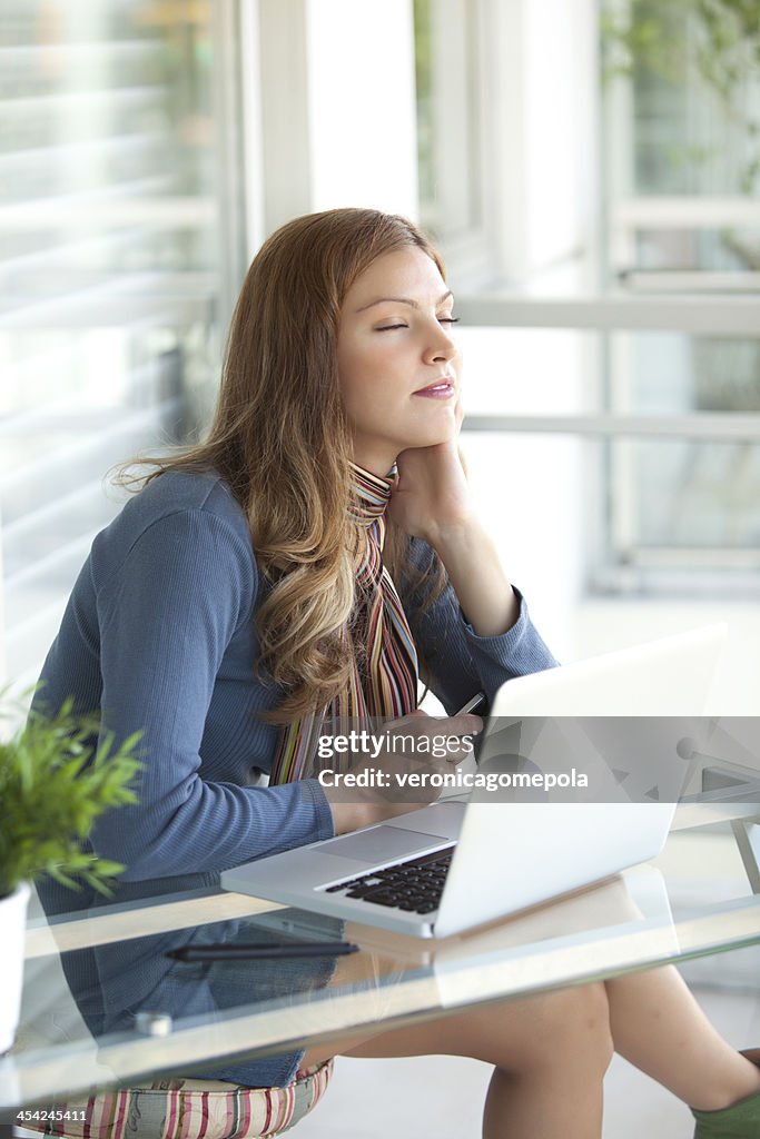 White collar worker in her office