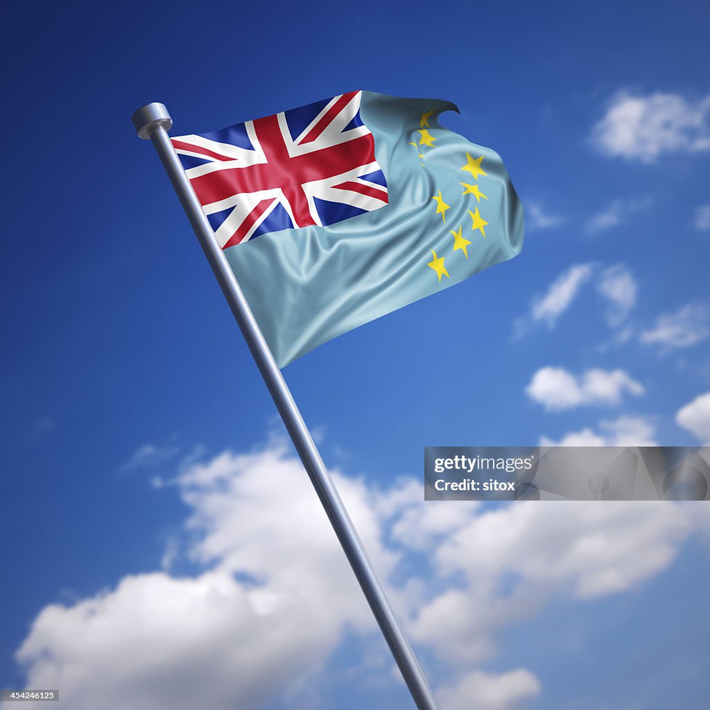 Flag of Tuvalu against blue sky